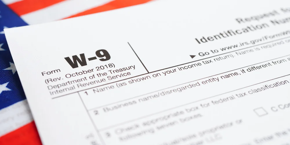 W-9 form on the USA flag